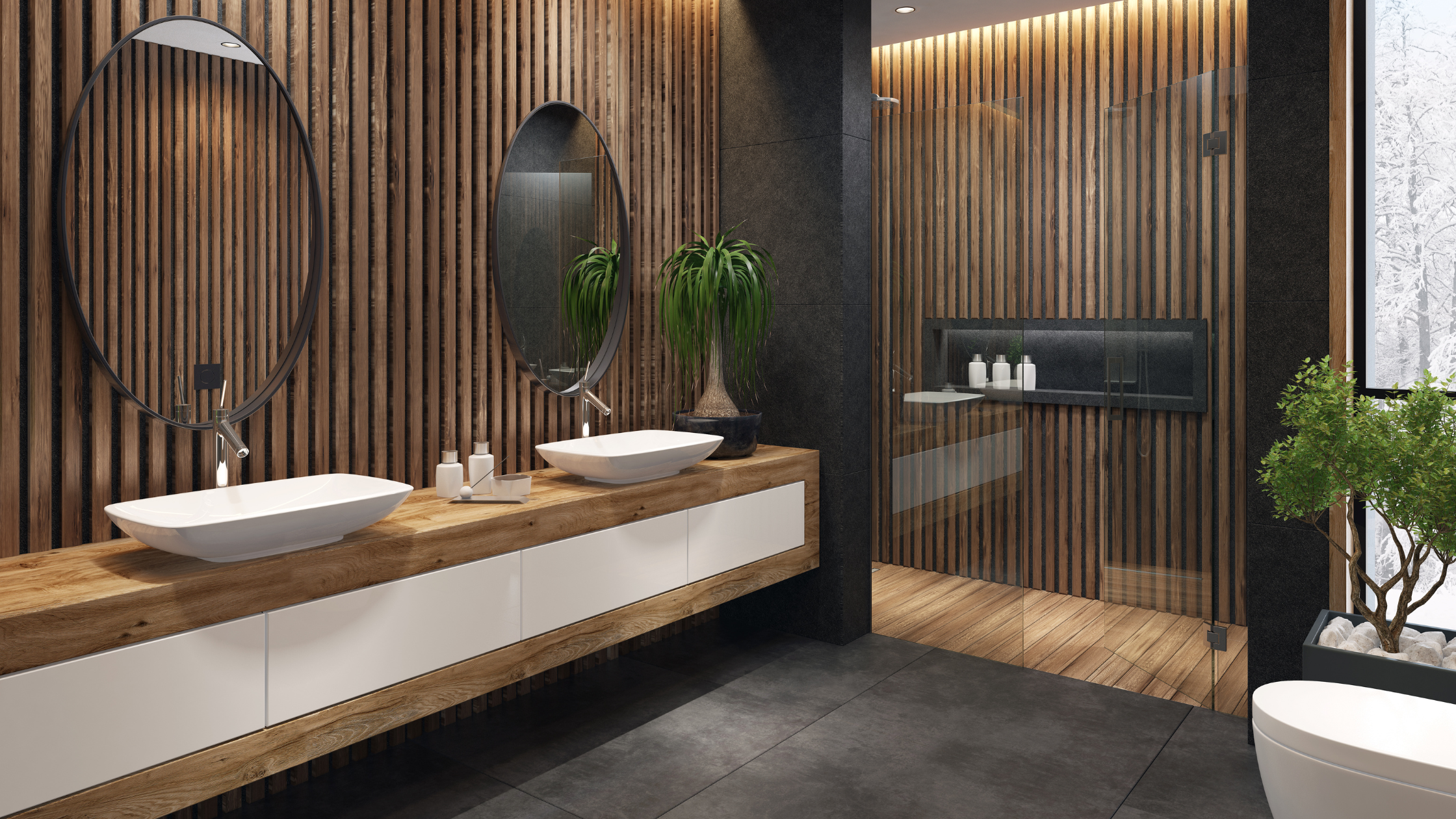 floating vanity and wood paneling in bathroom